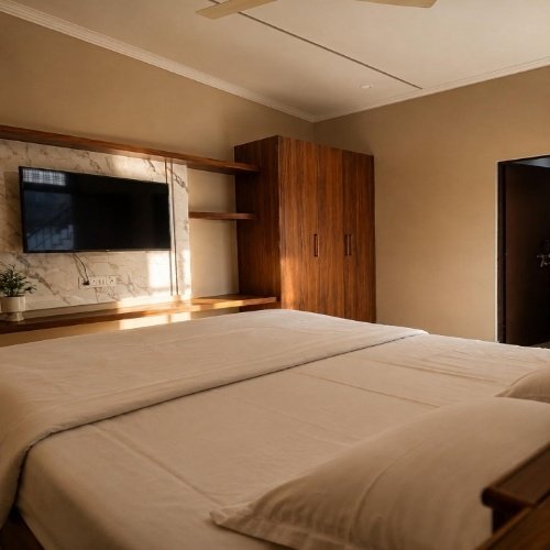 Peaceful and comfortable guest room at Rangoli Garden Homestay in Varanasi