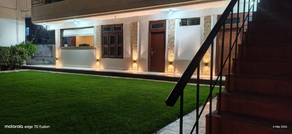 Peaceful garden villa stay in Varanasi at Rangoli Garden Homestay featuring lush greenery, spacious rooms, and modern amenities.